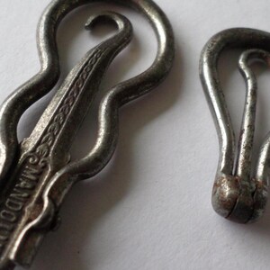 2 small  Antique steel folding button  hooks - one mandoline depose the other tiny and plain