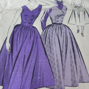 May include: A vintage sewing pattern for a purple dress with a V-neckline, double-breasted buttons, and a full skirt. The pattern includes instructions for making the dress in two different styles.