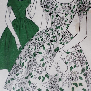 May include: Two vintage dress patterns, one with a green solid color and the other with a white background and a floral pattern of green leaves and white roses.
