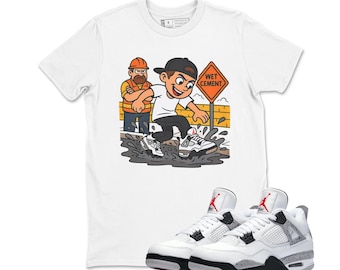 Camiseta Jordan 4 White Cement, color cemento, gris y negro.