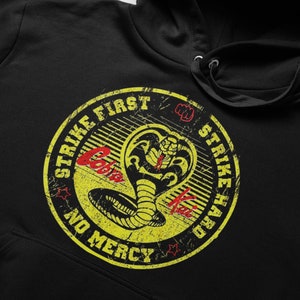 Cobra Kai, Movie-inspired Hoodie Distressed Logo. Ask For Other Colours Or Sweatshirt, V-Neck, T-shirt or Tank top