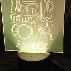 Music themed personalised with any name of your choice LED acrylic nightlight.  Comes with remote to control the colours you want.