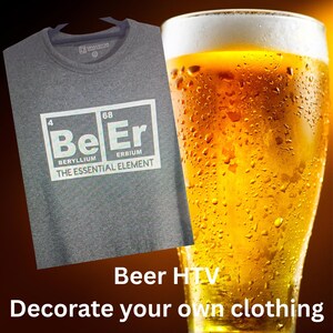 May include: A grey crew neck t-shirt featuring a white graphic with the words "Be Er" and the chemical symbols for Beryllium and Erbium. A pint of beer with condensation is in the background. The text "Beer HTV" and "Decorate your own clothing" is at the bottom.