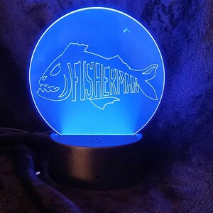 Fisherman LED acrylic nighlight.  Comes with remote to control the colours you want, including strobe, flashing, fade.  Battery or USB.