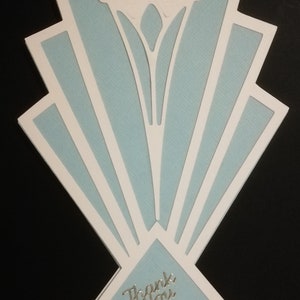 Una bellissima carta 5x7 fatta a mano in un iconico stile Art Déco con il sentimento Grazie. Può essere personalizzato con la tua frase.