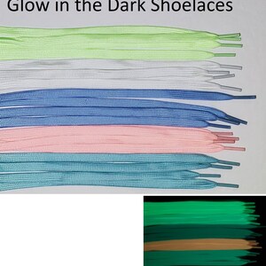 May include: A set of glow-in-the-dark shoelaces in various colors, including green, white, blue, pink, and teal. The shoelaces are laid out in rows, with the glow-in-the-dark effect visible in a separate image.