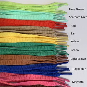 May include: A collection of shoelaces in various colors, including lime green, seafoam green, red, tan, yellow, green, light brown, royal blue, and magenta.