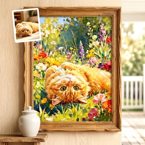 May include: A framed oil painting of a fluffy orange tabby cat lying on its back in a vibrant field of colorful wildflowers. The cat has bright green eyes and is looking upward. A small inset photo of the same cat is visible in the top left corner.
