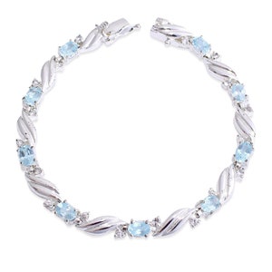 Vintage Sky Blue Topaz Sterling Silver Tennis Bracelet