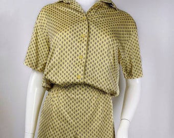vintage beige midi-jurk van AKRIS uit de jaren 70. jurk met abstracte knopen. maat medium
