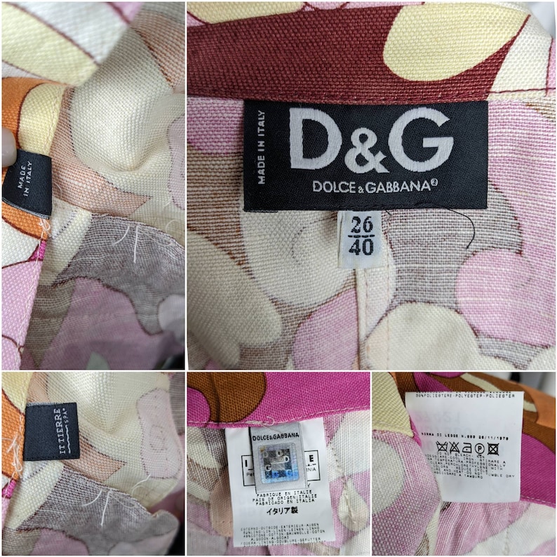 May include: A white, pink, and brown patterned fabric with a black label that reads "D&G DOLCE & GABBANA" and a size tag that reads "26 40".