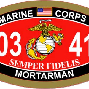 May include: A patch with a red and black background, featuring the words "MARINE CORPS" and "03 41". The patch includes a gold eagle, globe, and anchor emblem, with the text "SEMPER FIDELIS" and "MORTARMAN". An American flag is at the top.