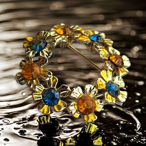 Vintage Flower Circle Pin Brooch, Gold Tone with Blue & Gold Rhinestone Centers, Mid Century Accessory, Perfect Gift for Her