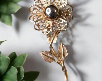 Jolie petite broche vintage des années 1990 en argent sertie d'onyx. - France