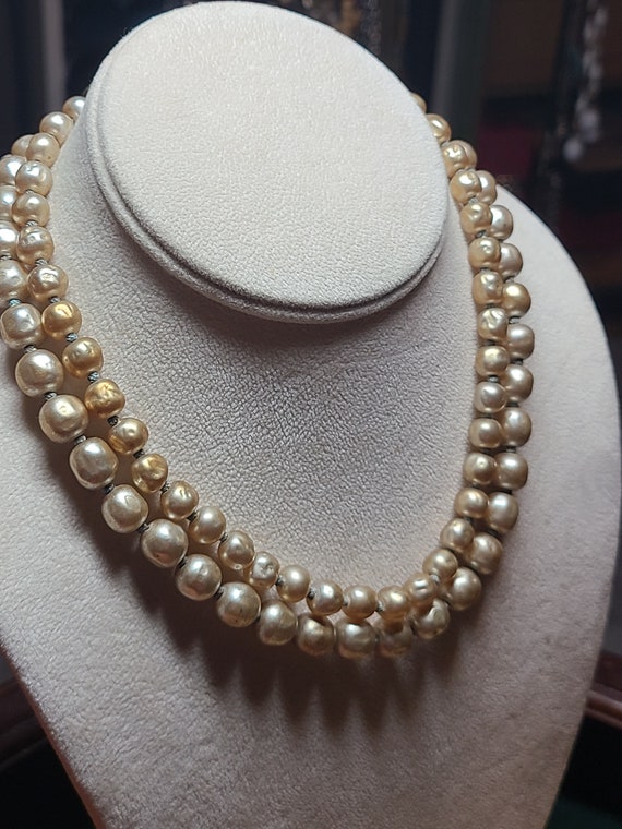 Chaine de cou en or blanc 18 carats et pendentif diamant 0,15 carat double cercles Chaine de cou en or blanc 18 carats et pendentif diamant 0,15 carat double cercles