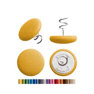 May include: Four yellow fabric-covered buttons with metal spring attachments. One button is shown from the side, another from the top, and two from the front and back. A color palette of various colors is shown at the bottom.