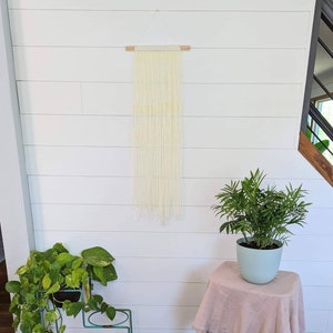 Ivory macrame wood wall hanging