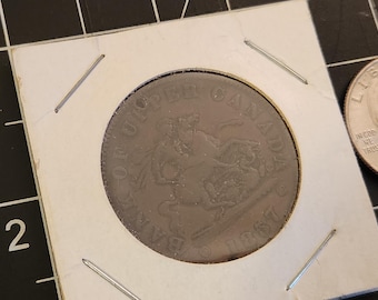 Genuine 1857 Bank of Upper Canada One Penny Bank Token Drilled w/ Small Hole for Necklace - In Plastic Sleeve