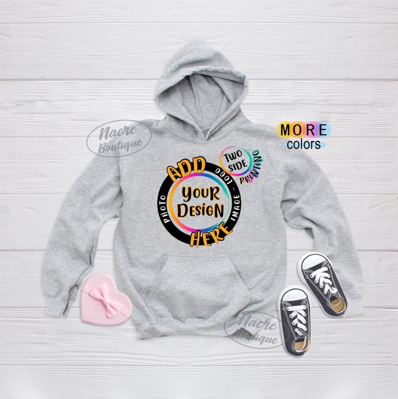 May include: Grey hooded sweatshirt with a black circle that says "ADD YOUR DESIGN HERE" in rainbow colours. The circle has a smaller circle inside that says "IMAGE - TWO SIDE PRINTING".