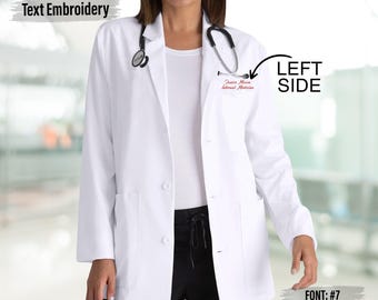 May include: A white lab coat with a stethoscope around the neck. The coat has a red embroidered name and title on the left side. The coat has three buttons and two pockets. The text "Text Embroidery" is at the top.