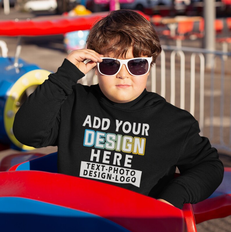 May include: A black hooded sweatshirt with the text "ADD YOUR DESIGN HERE TEXT-PHOTO DESIGN-LOGO" in colourful letters.