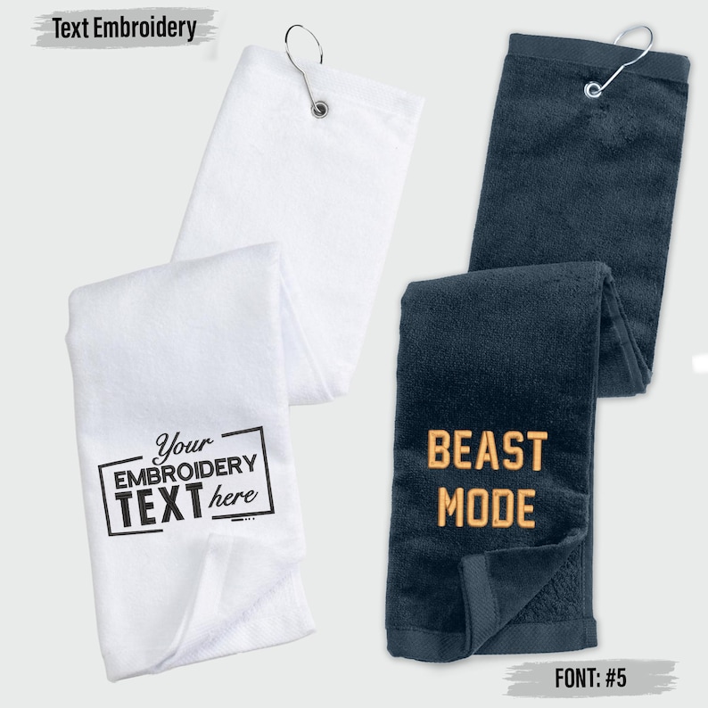 a collection of text embroidered towels, each with a unique design and text. The towels are arranged in a row, showcasing various styles and sizes.