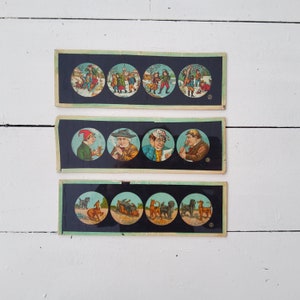 May include: Three vintage paper strips with black borders and circular images. The first strip shows five images of people in winter clothing. The second strip shows four images of people in 19th-century clothing. The third strip shows five images of dogs in various poses.