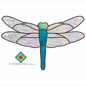 May include: A stained glass dragonfly with iridescent wings and a teal blue body. The dragonfly is outlined in black.