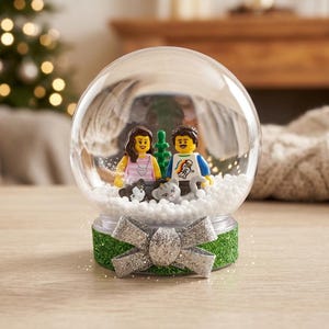Personalized mini me minifigure snow globe.