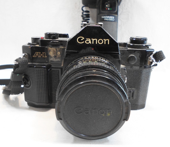 Canon A-1 35mm SLR Camera, FD 50mm F1.8 Lens, Camera Accessories