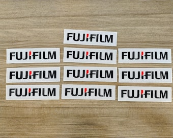 Parche termoadhesivo FUJIFILM: Aplique bordado de la marca de cámara (10 unidades)