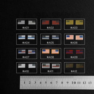 May include: A collection of twelve rectangular patches featuring the American flag in various color schemes. Each patch is labeled with a unique code, such as #A01, #A02, and #A03. A ruler is placed at the bottom of the image, with measurements in inches.
