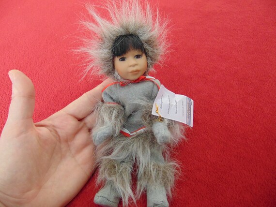 porcelain eskimo doll