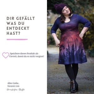 May include: A woman wearing a purple and blue dress with a forest print. The dress has a scoop neck and 3/4 sleeves. The dress is knee-length and has a fitted bodice and a flared skirt. The woman is wearing a purple beanie and black tights. The text on the image reads "Dir gef&auml;llt was du entdeckt hast?" and "Speichere dieses Produkt als Favorit, damit du es nicht vergisst!" and "Alles Liebe, Swanni von Graustufen-Stoffe".
