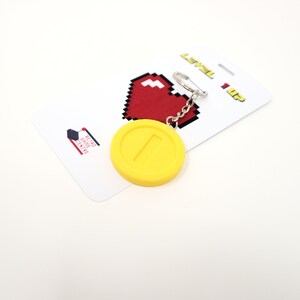 Super Retro Myntnyckelring: Retro Gaming Accessory bild 3