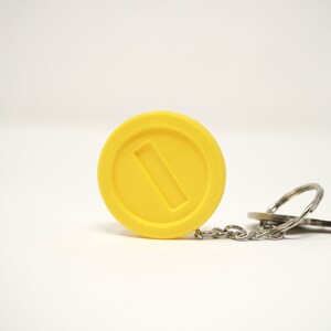 Super Retro Myntnyckelring: Retro Gaming Accessory bild 4
