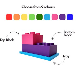 May include: A three-piece toy block set with a tray, a bottom block, and a top block. Choose from 9 colors for each piece.