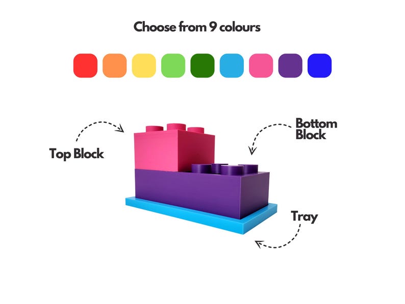 May include: A three-piece toy block set with a tray, a bottom block, and a top block. Choose from 9 colors for each piece.