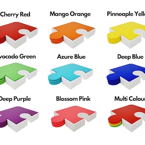 May include: Nine colorful puzzle pieces stacked on top of each other. The colors are cherry red, mango orange, pineapple yellow, avocado green, azure blue, deep blue, deep purple, blossom pink, and multi-color.