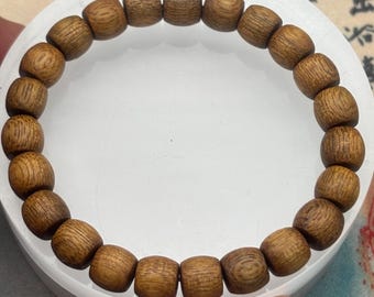 Pulsera de madera de agar camboyana rara, resina amarilla, madera de agar de bosque antiguo, fragancia multicapa única, pulsera de meditación y bienestar.