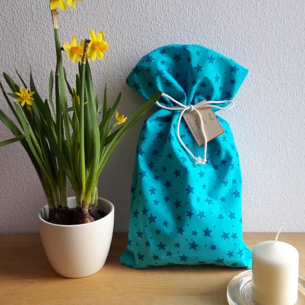 one bag - many sizes, gift bags made of organic cotton (kbA) in turquoise with stars