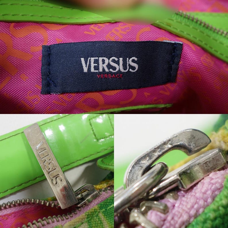 K&ouml;nnte beinhalten: Nahaufnahme einer Versus Versace Handtasche. Die Tasche hat eine leuchtend gr&uuml;ne Lacklederbesatz und einen Rei&szlig;verschluss mit einem pink-orangefarbenen Innenmuster. Ein marineblaues Etikett mit dem Versus Versace-Logo ist sichtbar.