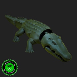 May include: Green plastic toy alligator with a textured surface and an open mouth. The alligator is lying on its belly with its legs outstretched.