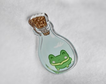 Frog In A Bottle Acrylic Pin