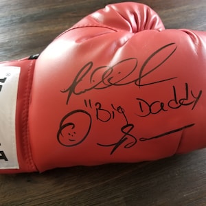 Riddick Bowe Signed Everlast Boxing Glove Inscribed &quot;Big Daddy&quot; (JSA COA)