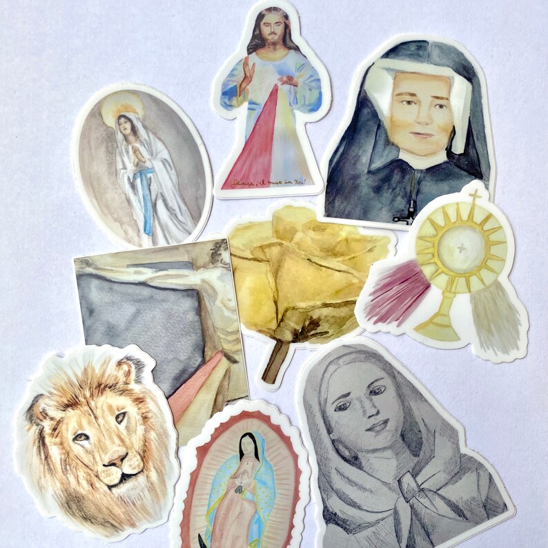 May include: A set of religious stickers featuring images of Jesus, Mary, a lion, a rose, and a monstrance. The stickers are printed on white paper and have a glossy finish.