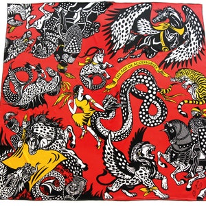 May include: A red square scarf with a black and white illustration of mythical creatures, including winged horses, lions, and serpents. A woman in a yellow dress is featured. The text "THE AGE OF ACCESSORIES" is on a yellow banner.