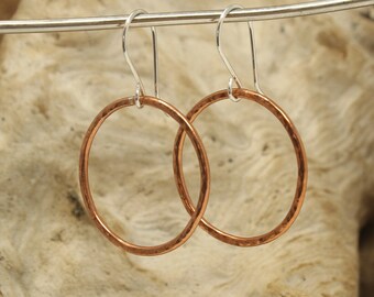 Medium copper hoop earrings with sterling silver ear wires.  Hammered Texture Copper Hoops.  1 inch Diameter Copper Hoops