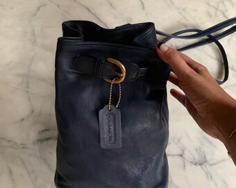 coach sling backpack