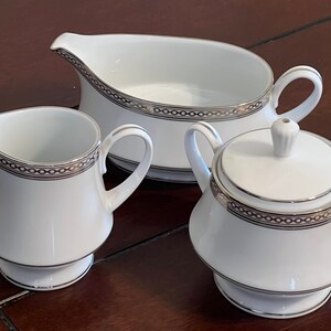 Noritake Legacy Splendor sugar bowl ,gravy boat and Cramer 4267 pattern, white with gold chain and platinum trim